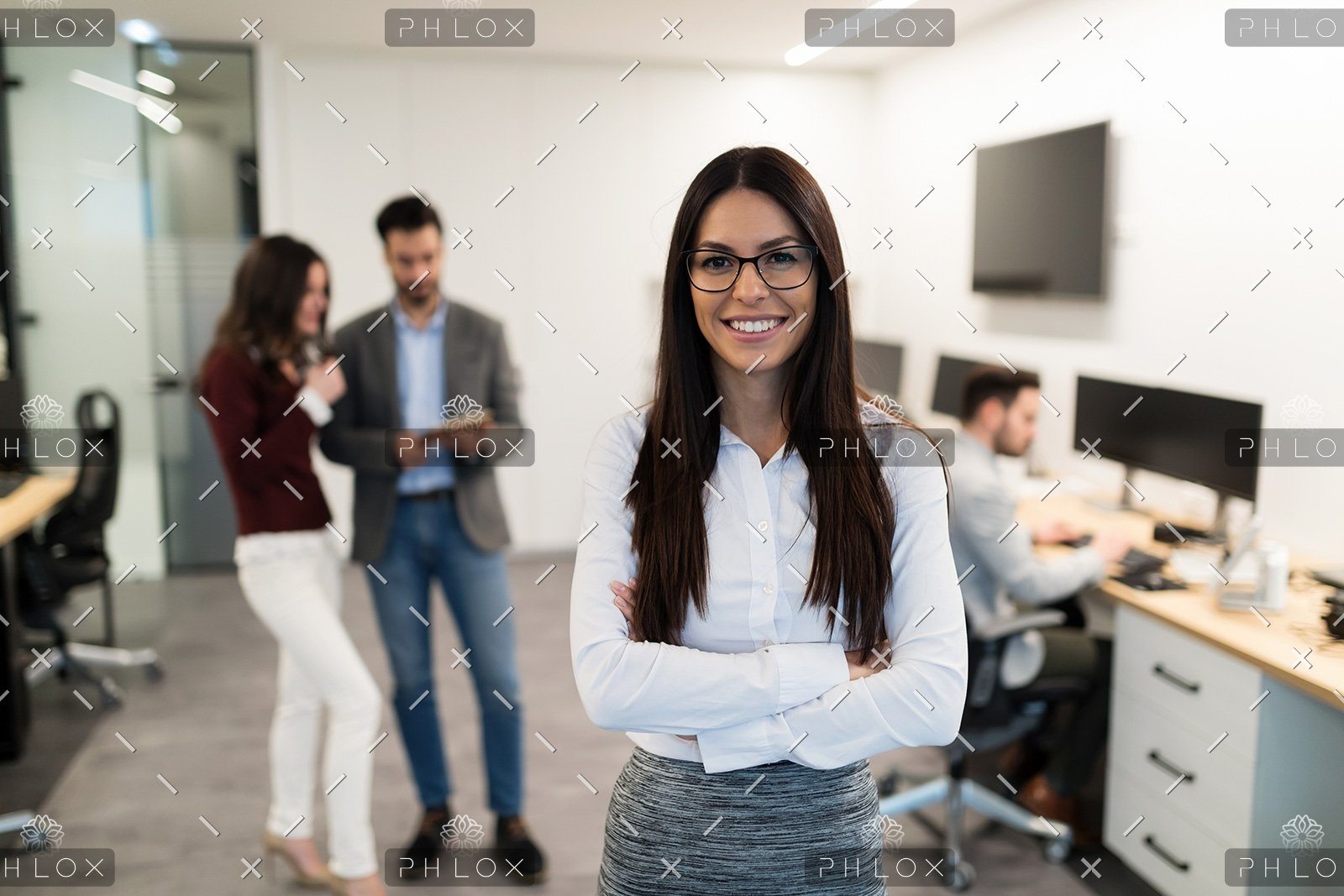 demo-attachment-472-portrait-of-young-businesswoman-posing-in-office-WEU5FBG